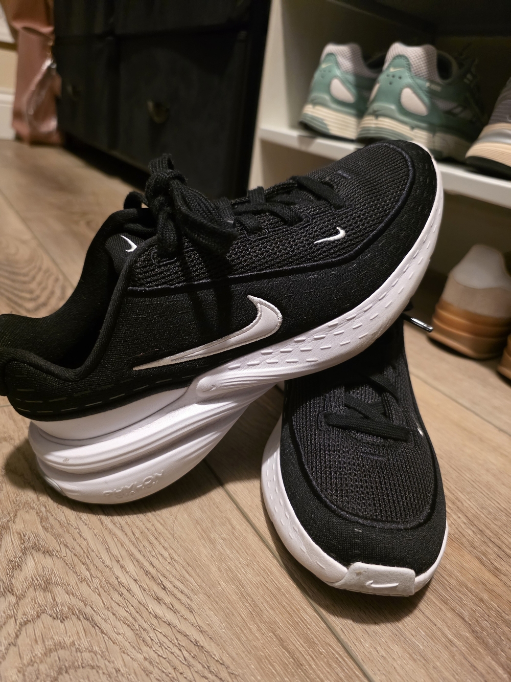 Nike Black & White Athletic Sneakers with Prominent Swoosh